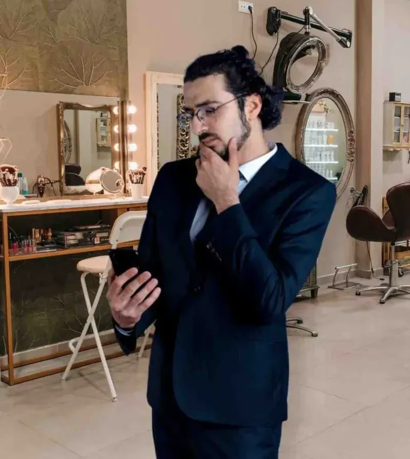 Salon owner using Hair Salon Management Software, highlighting the daily challenges of running a salon.